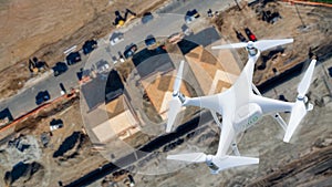 Unmanned Aircraft System UAV Quadcopter Drone Over Work Site