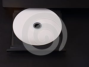 Blank DVD or CD in an Ejected Multimedia Player Tray photo