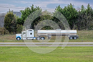 Unmarked Gasoline Delivery Tanker Truck On Freeway