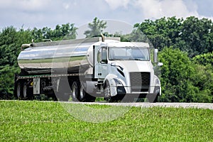 Unmarked Gasoline Delivery Tanker Truck On The Highway photo
