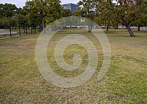 Unmarked graves area, Freedman`s Cemetery Memorial in Dallas, Texas photo