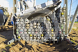 Unmounted scaffolding elements piled at construction site