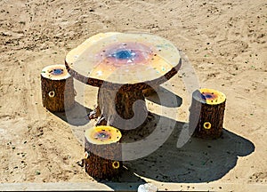 Unnatural table and chairs in the form of stumps