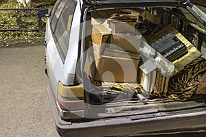 Unnecessary garbage carried in the trunk of an old car