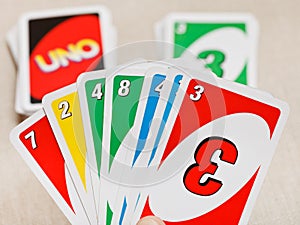 Uno card game pack in hand