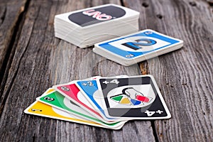 Uno card game on wood table