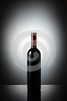 Unopened bottle of red wine photo