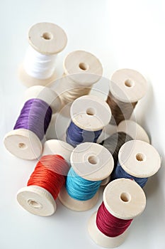 Unorganized colorful spools thread