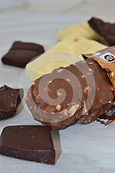 an unpacked chocolate bar lies on the table