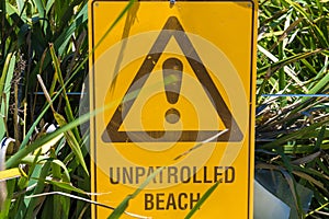 Unpatrolled beach warning sign