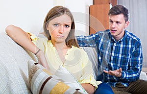 Unpleased person criticizing spouse