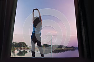 Unplugged Life Concept. Woman Relaxing by Nature in Countryside, Young Female Exercise on the Deck