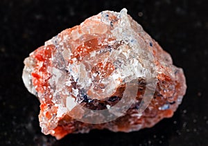 Unpolished red Rock Salt Halite on black