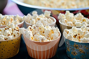 unpopped popcorn bowls on a shared table