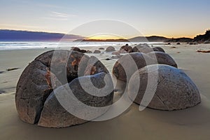 Unreal Moeraki Boulders at low tide, Koekohe beach, New Zealand