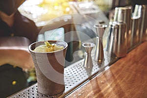 Unrecognizable bartender preparing cocktails, Skilled mixologist crafts beautiful creative cocktail.