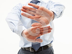 Unrecognizable businessman demonstrating a gesture of a rejecti