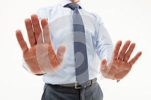 Unrecognizable businessman demonstrating a gesture of a rejecti