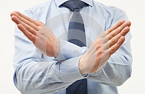 Unrecognizable businessman demonstrating a gesture of a rejecti