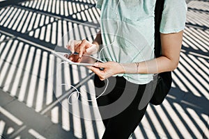 Unrecognizable close up portrait of young fitness asian woman