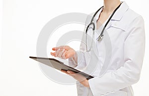 Unrecognizable doctor holding clipboard photo