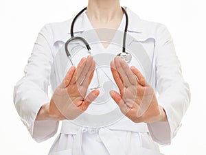 Unrecognizable doctor showing disabling gesture