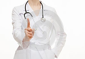 Unrecognizable doctor showing a warning gesture