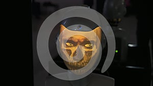 Unrecognizable fake face on display of robot. Futuristic cyborg machine