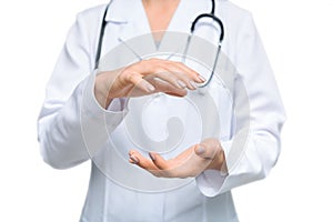 Unrecognizable female doctor measuring some invisible object