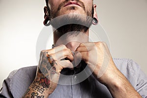 Unrecognizable hipster man with tattoos