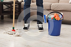 Unrecognizable man cleaning at home