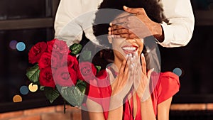 Unrecognizable Man Covering Girlfriend`s Eyes Holding Bouquet In Restaurant, Panorama