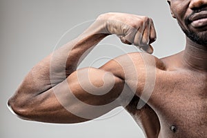 Unrecognizable man, fitness dedication, beautiful muscles