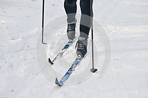 Unrecognizable Man Skiing On Winter Day