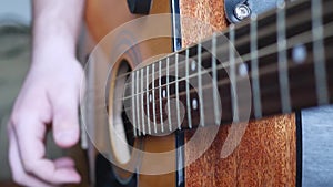 Unrecognizable Musician Playing Acoustic Guitar