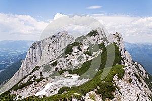 Unrecognizable people on top of the Grosser Donnerkogel Mountain in Alps, Gosau, Gmunden district, Upper Austria federal state