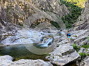 Unrecognizable Peoples walking to go canyoning in Chassezac gorges