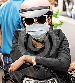 Unrecognizable Person with a Smog Face Mask