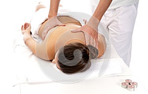 Unrecognizable woman receiving massage treatment