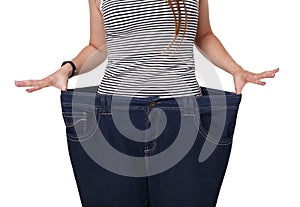 Unrecognizable woman torso, showing diet results isolated on white