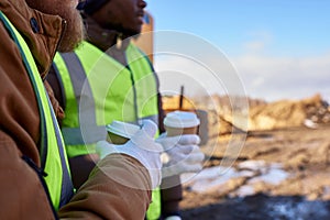 Unrecognizable Workers on Coffee Break