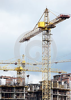 Unrecognizable workers on construction site photo