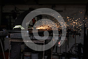 Unrecognized Blacksmith Forge Welding in Workshop