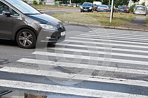 The car drove into an unregulated pedestrian crossing photo