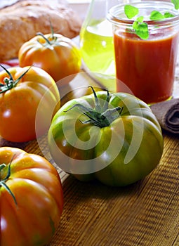 Unripe green ribbed tomato