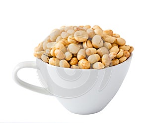 Unroasted coffee beans in cup