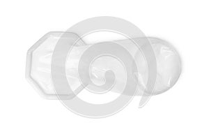 Unrolled female condom isolated on white, top view. Safe sex