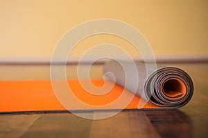 Unrolling Yoga Mat photo