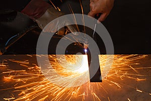 Unsafe work - Using plasma cutting machine without safety protection.