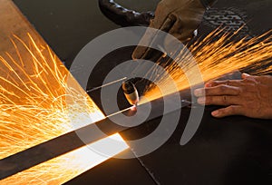 Unsafe work - Using plasma cutting machine without safety protection.